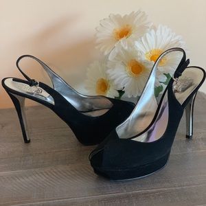 Guess black suede platform heels.